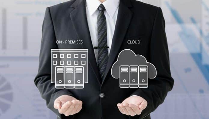 A business professional holding icons that represent Cloud vs On-Prem Legal Tech, symbolizing the comparison between traditional on-premises servers and modern cloud solutions for law firms.