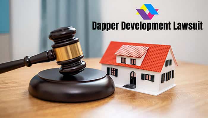 A gavel placed on a wooden table with a miniature house and the text 'Dapper Development Lawsuit' in the background, representing legal disputes in real estate development.