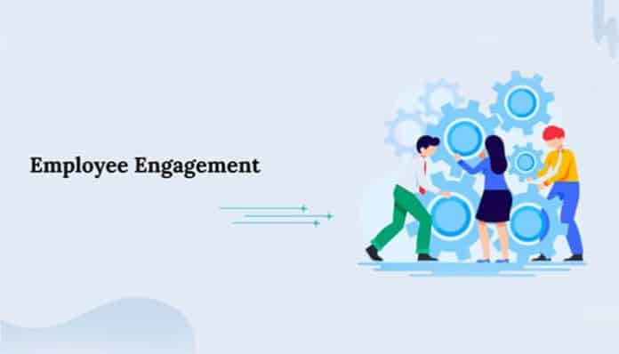Illustration of employees collaborating with gears symbolizing teamwork and productivity — concept of Employee Onboarding and Employee Engagement in modern workplaces.
