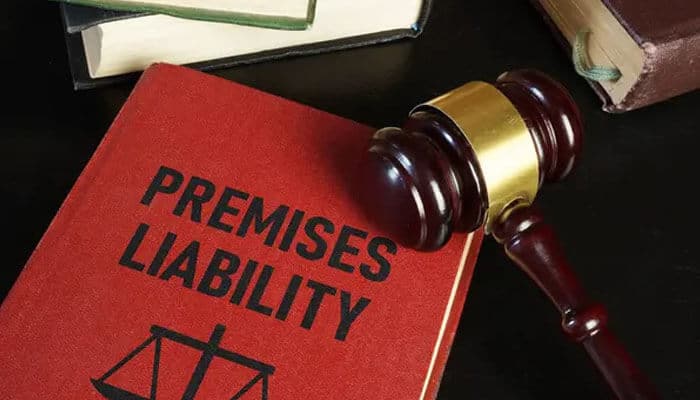 Legal book titled Premises Liability with a judge’s gavel placed on top, representing legal rights and claims for unsafe property conditions. 