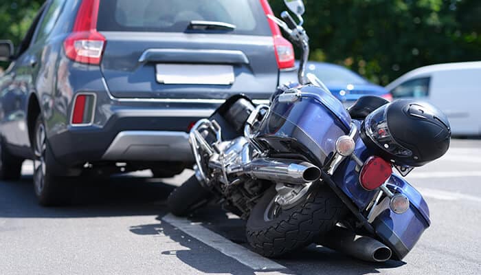 Motorcycle Owner in East Texas involved in a roadside collision, showing the financial and legal risks riders face after an accident.