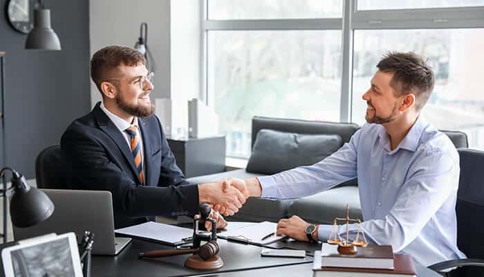 Legal Help Protects Your Health and Your Future - My Legal Opinion - My Legal Opinion Lawyer shaking hands with a client seeking legal help after a minor car accident.