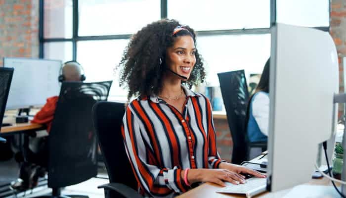 Virtual receptionist managing patient calls and scheduling for multiple medical practices in a modern call center