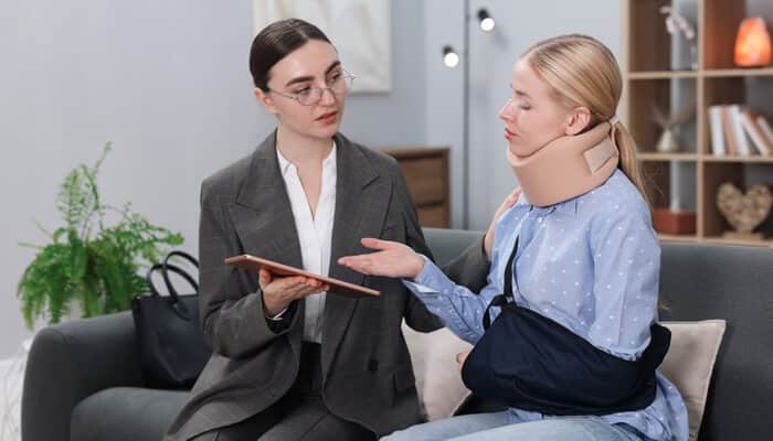 Addressing Long-Term Impact and Quality of Life 1 - My Legal Opinion Injured worker consulting with an attorney about medical and wage benefits following a Job Injury in Minnesota, illustrating workers’ comp support.