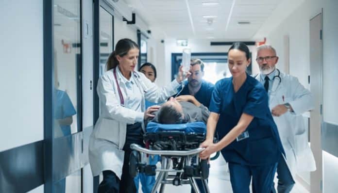 Medical team rushing a patient down the hallway during an emergency, potentially leading to an Emergency Room Error Lawsuit