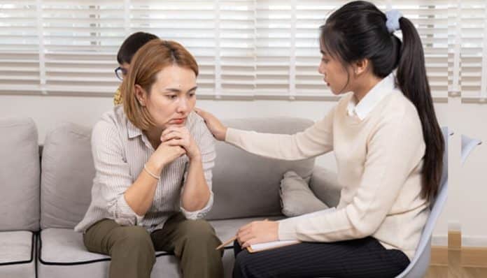 Therapist offering emotional support to a survivor during counseling, showing how Therapy Helps Survivors rebuild confidence and trust.