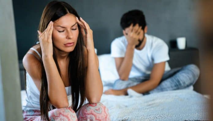Couple experiencing emotional distress, showing signs of anxiety and pain after a traumatic experience related to sexual trauma.
