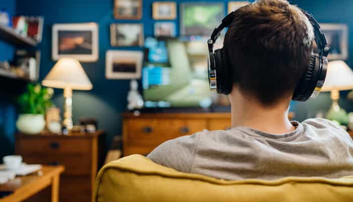 Mental and Emotional Effects of Video Game Addiction - Mylegalopinion - My Legal Opinion Young person playing video games, highlighting concerns about video game addiction lawsuit and its impact on mental health.