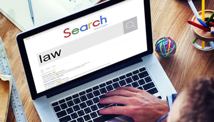 On-Page SEO for Law Firms - myleagalopinion - My Legal Opinion Close-up of a person searching for 'law' on a search engine, highlighting the importance of Lawyer SEO for improving Law Firms Search Rankings.
