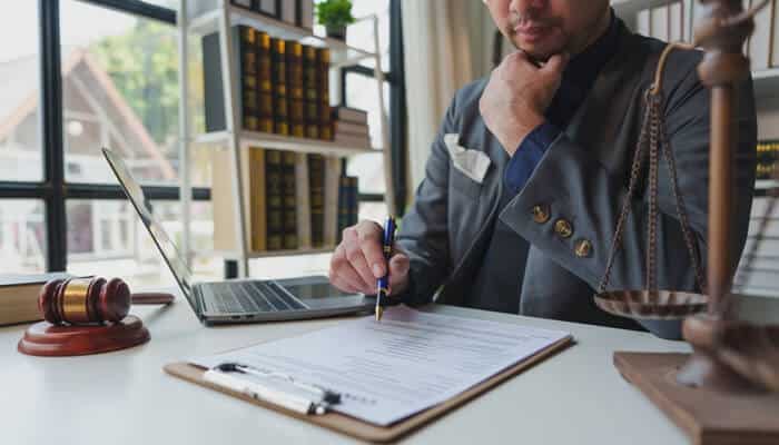 Strategic Legal Action 1 - My Legal Opinion Attorney reviewing documents addressing systemic legal issues and policy violations in regulatory compliance