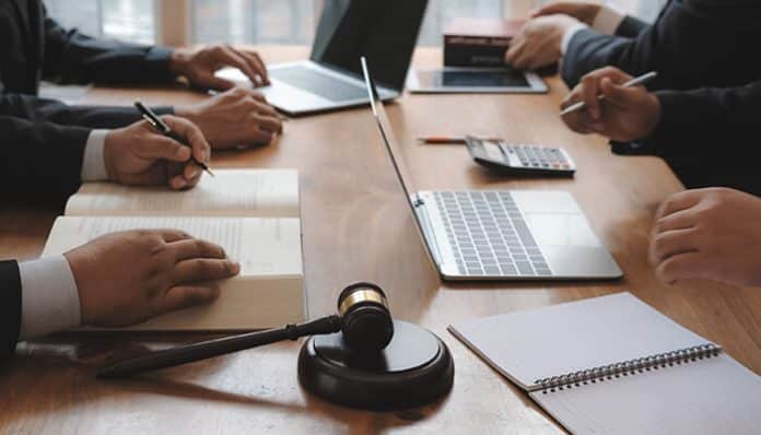 Top 20 Personal Injury Lawyers in the US for Serious Injury Claims, discussing case details during a legal consultation.