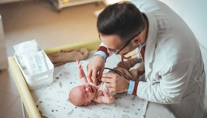 What Should Be Happening in the Days Following an Injury - Mylegalopinion - My Legal Opinion Doctor examining a newborn baby after birth, highlighting medical care issues commonly evaluated in a Birth Injury Claim.