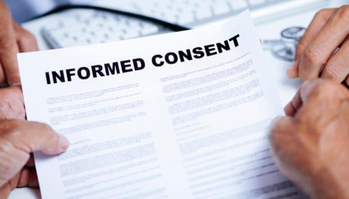 Informed Consent Failures in Wrongful Death Cases showing a signed medical consent document reviewed after a fatal treatment outcome