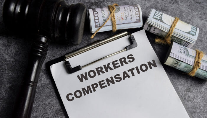 A Breakdown of Kentucky Workers Compensation Benefits - My Legal Opinion - My Legal Opinion Workers compensation laws document with gavel and stacks of money, highlighting the legal and financial aspects of Kentucky Workers' Compensation Laws.