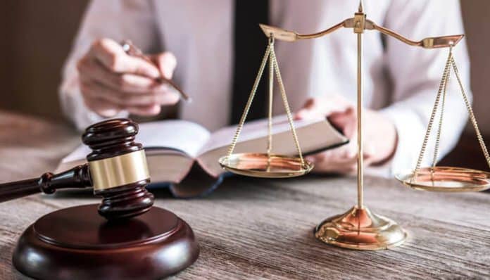Arizona Self-Defense Laws: Legal gavel and scales of justice representing the legal system.