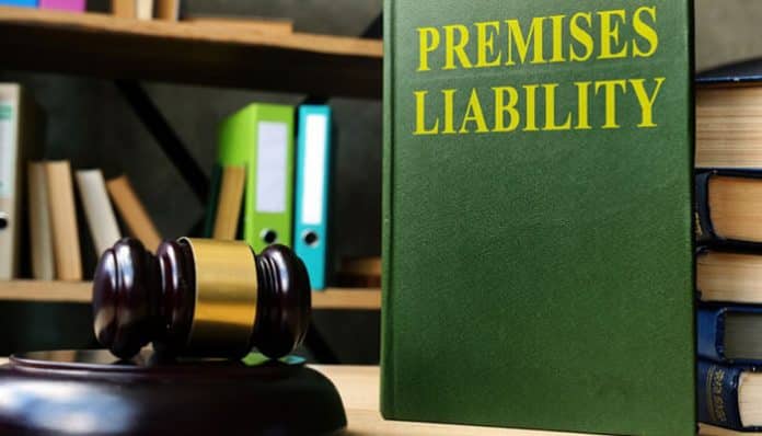 Premises Liability Lawyer: A law book titled 'Premises Liability' with a gavel, symbolizing legal representation for injuries caused by unsafe property conditions.