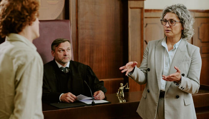 Preliminary Hearing - My Legal Opiinion - My Legal Opinion Criminal Court Process in Philadelphia: A defense attorney presenting a case in court while the judge listens to the proceedings.