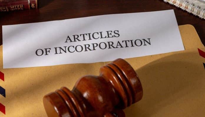 Legal document titled Articles of Incorporation with a gavel, explaining what are Articles of Incorporation and their role in business formation