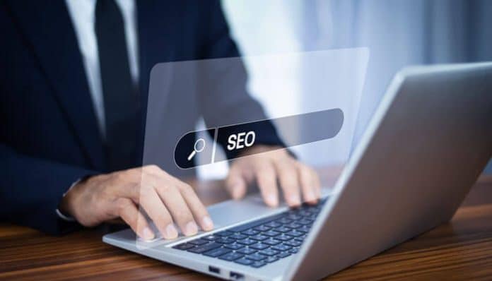 Law Firm SEO strategy analysis on laptop with business professional optimizing search rankings