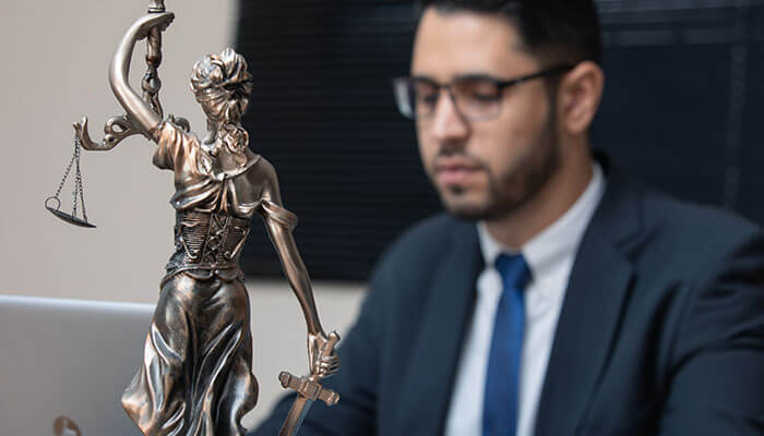 Received a Notice of a Civil Lawsuit or Demand Letter - My Legal Opinion - My Legal Opinion California voyeurism lawyer legal defense concept with attorney and Lady Justice statue representing privacy crime legal representation