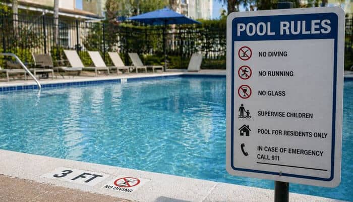 Common Defenses in Swimming Pool Accident Claims - My Legal Opinion - My Legal Opinion Swimming pool accident lawyer explains pool rules sign to prevent accidents and ensure safety compliance