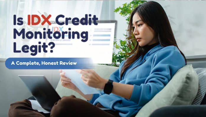 Is IDX Credit Monitoring Legit featured image showing a woman reviewing documents and laptop data, highlighting credibility and in‑depth analysis for the question Is IDX Credit Monitoring Legit?